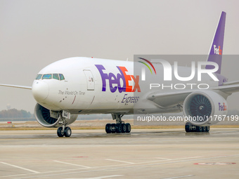 Flight FX5286 operated by FedEx lands at Qingdao Jiaodong International Airport in Qingdao, China, on November 11, 2024. (