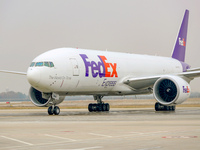 Flight FX5286 operated by FedEx lands at Qingdao Jiaodong International Airport in Qingdao, China, on November 11, 2024. (