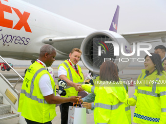 In Qingdao, China, on November 11, 2024, FedEx and airport staff present gifts to the crew. (