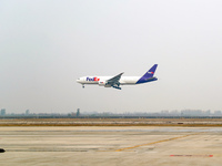 Flight FX5286 operated by FedEx lands at Qingdao Jiaodong International Airport in Qingdao, China, on November 11, 2024. (