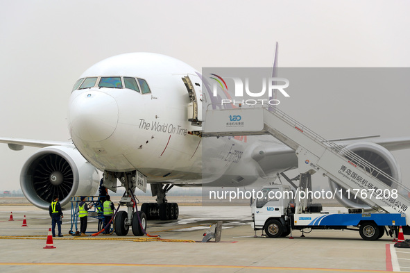 Flight FX5286 operated by FedEx lands at Qingdao Jiaodong International Airport in Qingdao, China, on November 11, 2024. 