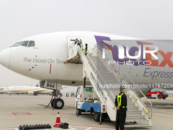 Flight FX5286 operated by FedEx lands at Qingdao Jiaodong International Airport in Qingdao, China, on November 11, 2024. (