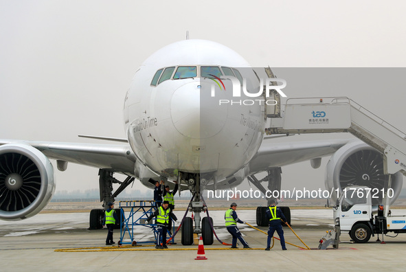 Flight FX5286 operated by FedEx lands at Qingdao Jiaodong International Airport in Qingdao, China, on November 11, 2024. 