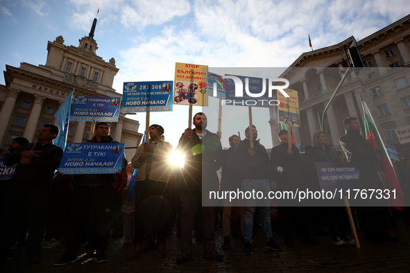 Supporters of ''MRF - New Beginning'' participate in a protest in front of the National Assembly on the first day of the parliament in Sofia...