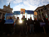 Supporters of ''MRF - New Beginning'' participate in a protest in front of the National Assembly on the first day of the parliament in Sofia...