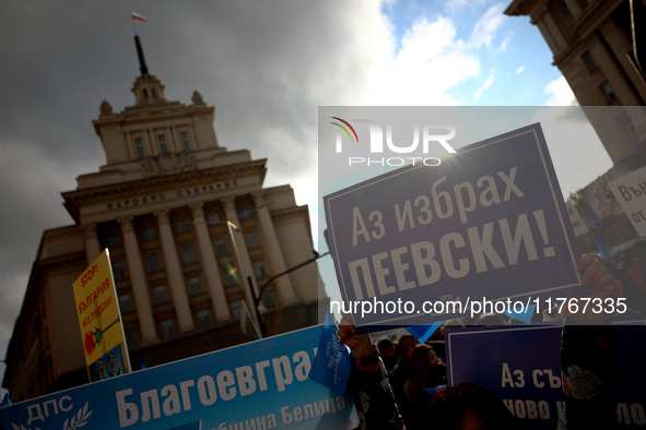 Supporters of ''MRF - New Beginning'' participate in a protest in front of the National Assembly on the first day of the parliament in Sofia...