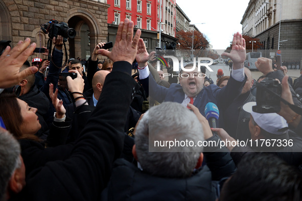 ''MRF - New Beginning'' party leader Delyan Peevski greets participants in the protest in front of the National Assembly on the first day of...