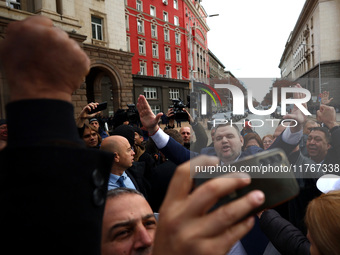 ''MRF - New Beginning'' party leader Delyan Peevski greets participants in the protest in front of the National Assembly on the first day of...