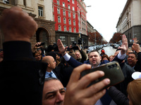 ''MRF - New Beginning'' party leader Delyan Peevski greets participants in the protest in front of the National Assembly on the first day of...