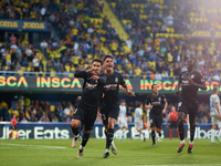 Ilias Akhomach of Villarreal CF celebrates after scoring the team's first goal next to his teammates Sergi Cardona and Gueye of Villarreal C...