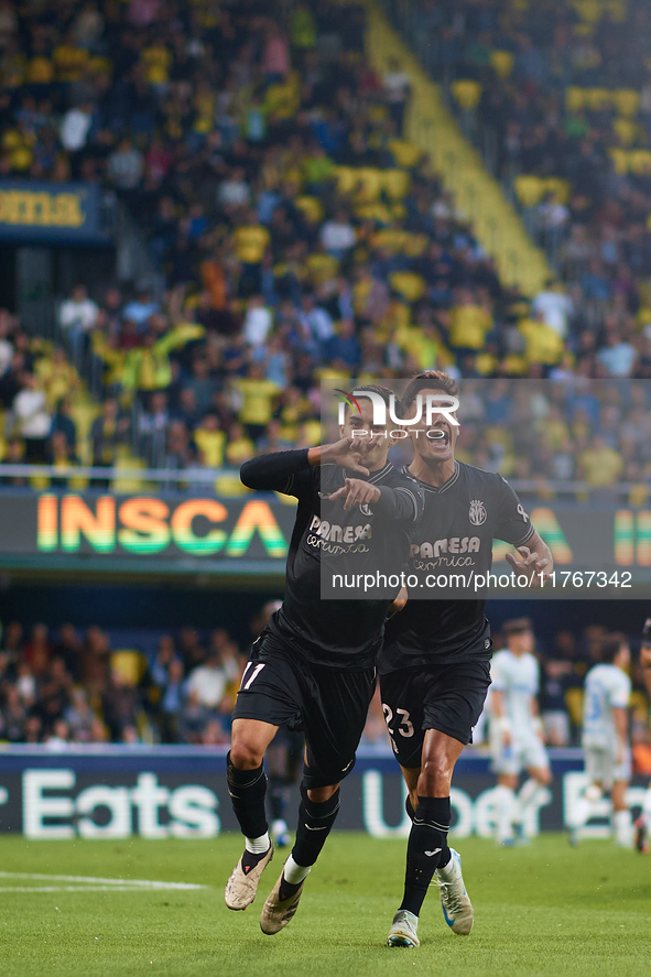 Ilias Akhomach of Villarreal CF celebrates after scoring the team's first goal next to his teammate Sergi Cardona of Villarreal CF during th...