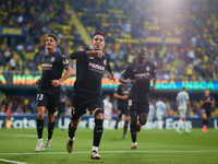 Ilias Akhomach of Villarreal CF celebrates after scoring the team's first goal next to his teammate Sergi Cardona and Gueye of Villarreal CF...