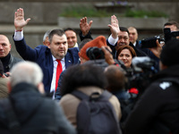 ''MRF - New Beginning'' party leader Delyan Peevski greets participants in the protest in front of the National Assembly on the first day of...