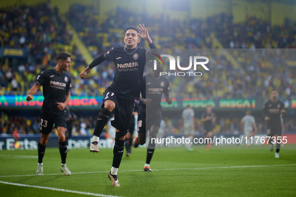 Ilias Akhomach of Villarreal CF celebrates after scoring the team's first goal during the LaLiga EA Sports match between Villarreal CF and D...