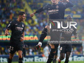 Ilias Akhomach of Villarreal CF celebrates after scoring the team's first goal during the LaLiga EA Sports match between Villarreal CF and D...