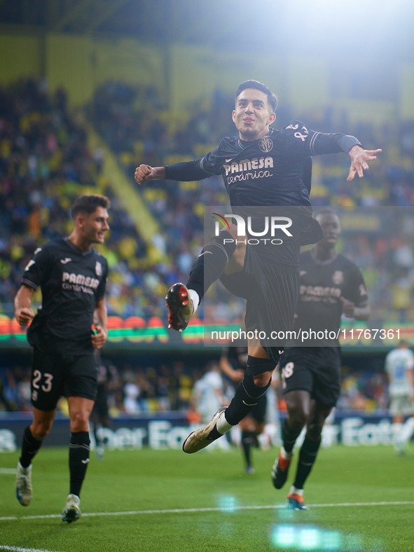 Ilias Akhomach of Villarreal CF celebrates after scoring the team's first goal during the LaLiga EA Sports match between Villarreal CF and D...