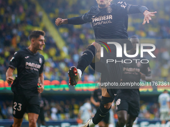 Ilias Akhomach of Villarreal CF celebrates after scoring the team's first goal during the LaLiga EA Sports match between Villarreal CF and D...