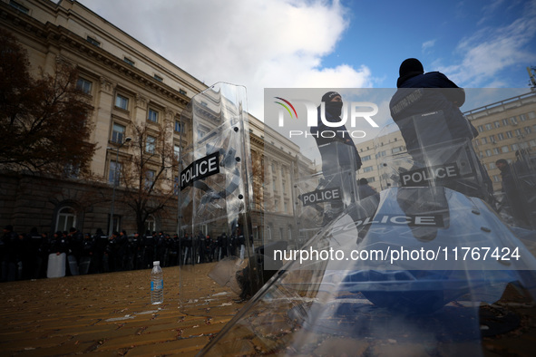 Police officers guard the National Assembly building on the first day of parliament in Sofia, Bulgaria, on November 11, 2024. 