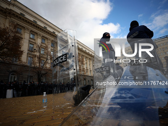 Police officers guard the National Assembly building on the first day of parliament in Sofia, Bulgaria, on November 11, 2024. (