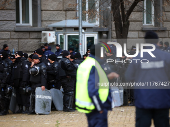 Police officers guard the National Assembly building on the first day of parliament in Sofia, Bulgaria, on November 11, 2024. (