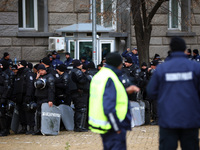 Police officers guard the National Assembly building on the first day of parliament in Sofia, Bulgaria, on November 11, 2024. (