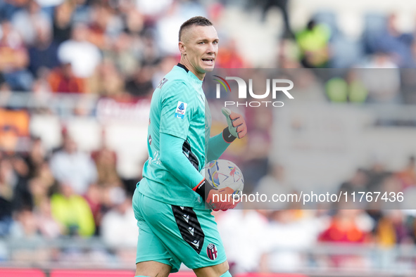 Lukasz Skorupski of Bologna FC looks on during the Serie A Enilive match between AS Roma and Bologna FC at Stadio Olimpico on November 10, 2...