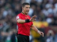 Referee Gianluca Manganiello gestures during the Serie A Enilive match between AS Roma and Bologna FC at Stadio Olimpico on November 10, 202...