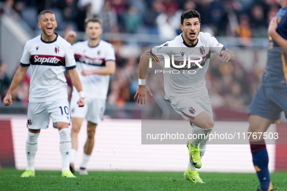 Riccardo Orsolini of Bologna FC celebrates after scoring second goal during the Serie A Enilive match between AS Roma and Bologna FC at Stad...