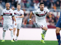 Riccardo Orsolini of Bologna FC celebrates after scoring second goal during the Serie A Enilive match between AS Roma and Bologna FC at Stad...