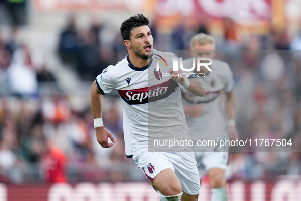 Riccardo Orsolini of Bologna FC celebrates after scoring second goal during the Serie A Enilive match between AS Roma and Bologna FC at Stad...