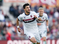 Riccardo Orsolini of Bologna FC celebrates after scoring second goal during the Serie A Enilive match between AS Roma and Bologna FC at Stad...