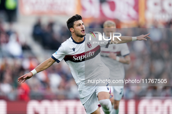 Riccardo Orsolini of Bologna FC celebrates after scoring second goal during the Serie A Enilive match between AS Roma and Bologna FC at Stad...