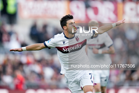 Riccardo Orsolini of Bologna FC celebrates after scoring second goal during the Serie A Enilive match between AS Roma and Bologna FC at Stad...