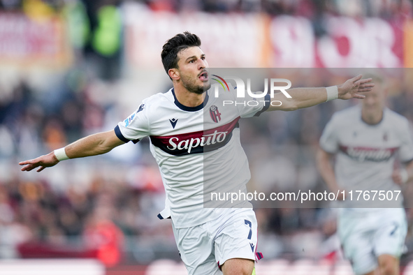 Riccardo Orsolini of Bologna FC celebrates after scoring second goal during the Serie A Enilive match between AS Roma and Bologna FC at Stad...