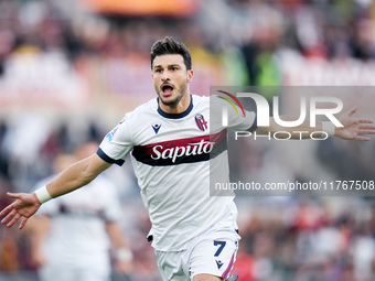 Riccardo Orsolini of Bologna FC celebrates after scoring second goal during the Serie A Enilive match between AS Roma and Bologna FC at Stad...