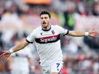 Riccardo Orsolini of Bologna FC celebrates after scoring second goal during the Serie A Enilive match between AS Roma and Bologna FC at Stad...