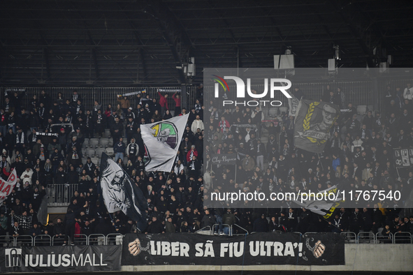 Fans of Universitatea Cluj attend the Superliga match between Universitatea Cluj and FCSB at Cluj Arena in Cluj, Romania, on November 10, 20...