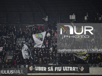 Fans of Universitatea Cluj attend the Superliga match between Universitatea Cluj and FCSB at Cluj Arena in Cluj, Romania, on November 10, 20...