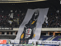 Fans of Universitatea Cluj attend the Superliga match between Universitatea Cluj and FCSB at Cluj Arena in Cluj, Romania, on November 10, 20...