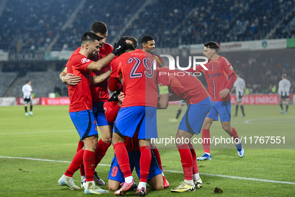 Players of FCSB celebrate during the Superliga match between Universitatea Cluj and FCSB at Cluj Arena in Cluj, Romania, on November 10, 202...