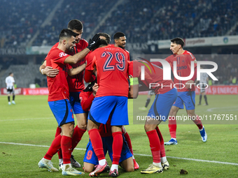 Players of FCSB celebrate during the Superliga match between Universitatea Cluj and FCSB at Cluj Arena in Cluj, Romania, on November 10, 202...