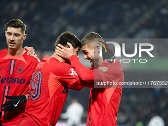 Players of FCSB celebrate during the Superliga match between Universitatea Cluj and FCSB at Cluj Arena in Cluj, Romania, on November 10, 202...