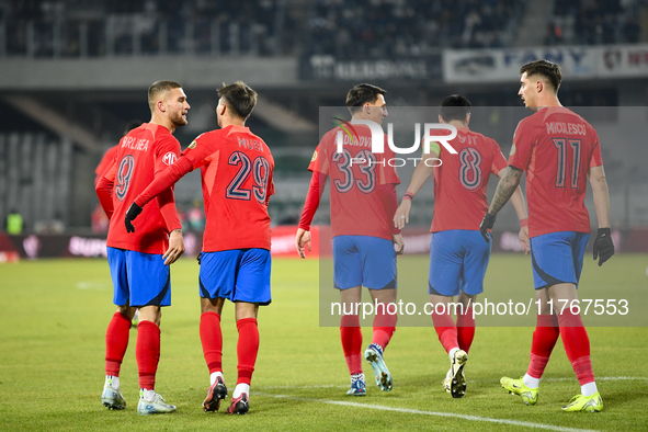 Players of FCSB celebrate during the Superliga match between Universitatea Cluj and FCSB at Cluj Arena in Cluj, Romania, on November 10, 202...