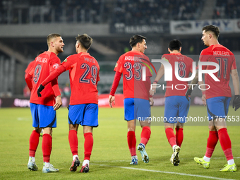 Players of FCSB celebrate during the Superliga match between Universitatea Cluj and FCSB at Cluj Arena in Cluj, Romania, on November 10, 202...