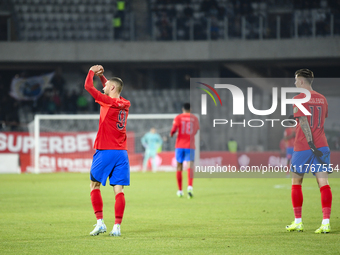 Players of FCSB celebrate during the Superliga match between Universitatea Cluj and FCSB at Cluj Arena in Cluj, Romania, on November 10, 202...