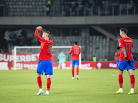 Players of FCSB celebrate during the Superliga match between Universitatea Cluj and FCSB at Cluj Arena in Cluj, Romania, on November 10, 202...