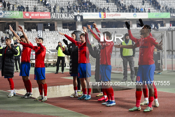 Players of FCSB celebrate during the Superliga match between Universitatea Cluj and FCSB at Cluj Arena in Cluj, Romania, on November 10, 202...