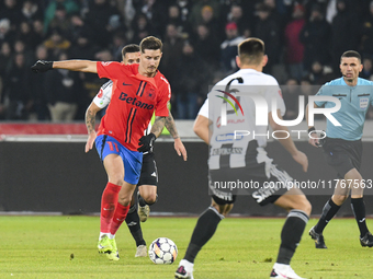 David Miculescu plays during the Superliga match between Universitatea Cluj and FCSB at Cluj Arena in Cluj, Romania, on November 10, 2024. (