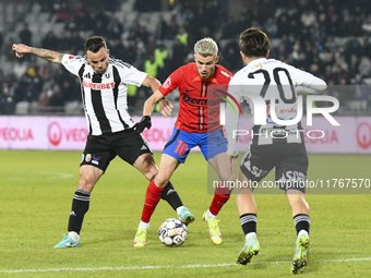 Dan Nistor and Ovidiu Popescu are in action during the Superliga match between Universitatea Cluj and FCSB at Cluj Arena in Cluj, Romania, o...