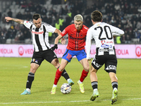 Dan Nistor and Ovidiu Popescu are in action during the Superliga match between Universitatea Cluj and FCSB at Cluj Arena in Cluj, Romania, o...